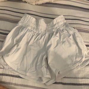 Lululemon 4” tracker shorts, size 0 white